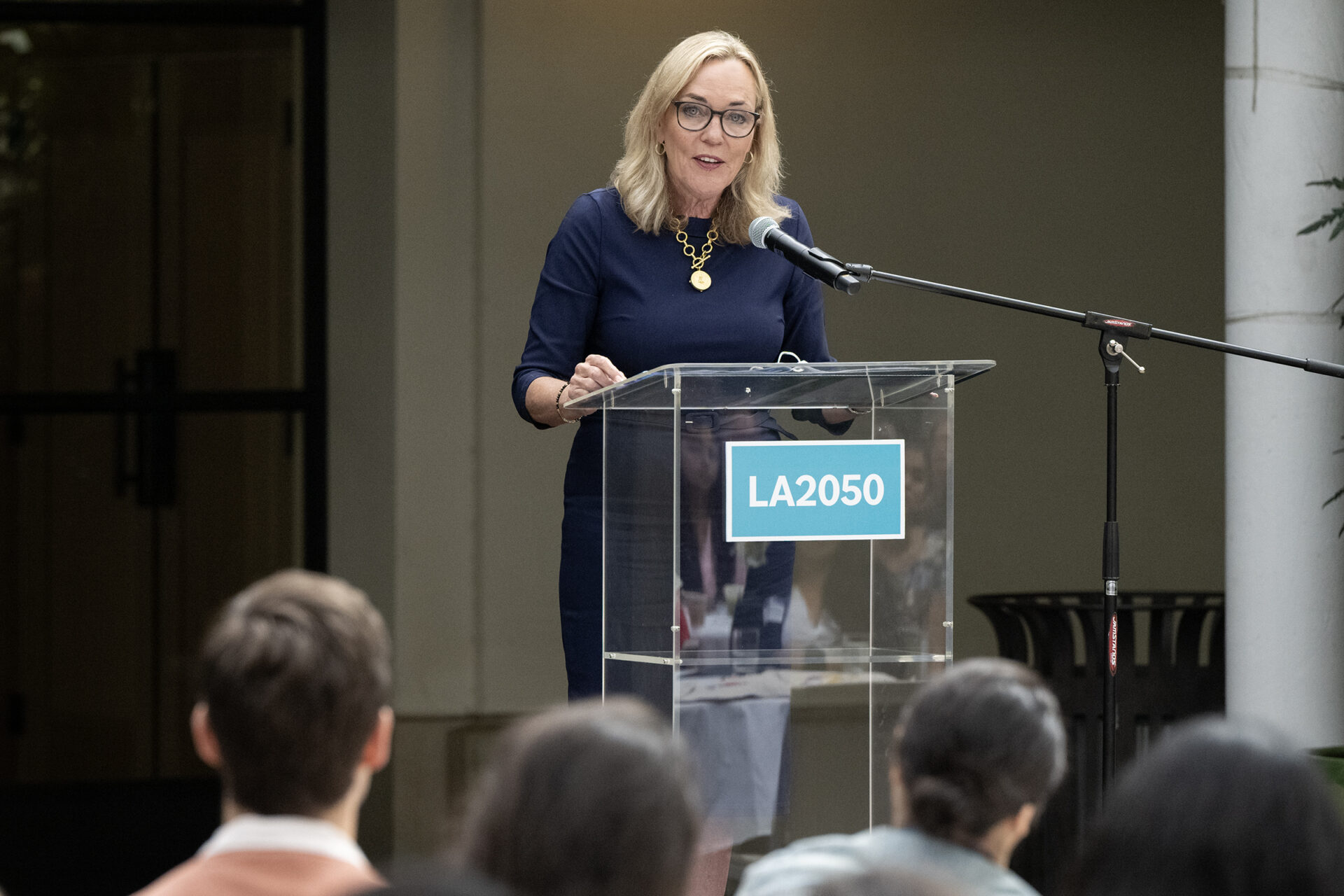 Supervisor Barger speaks at a podium at the LA2050 Grantees Showcase.