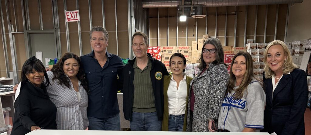 Supervisor Barger stands with Governor Newsom and community leaders.