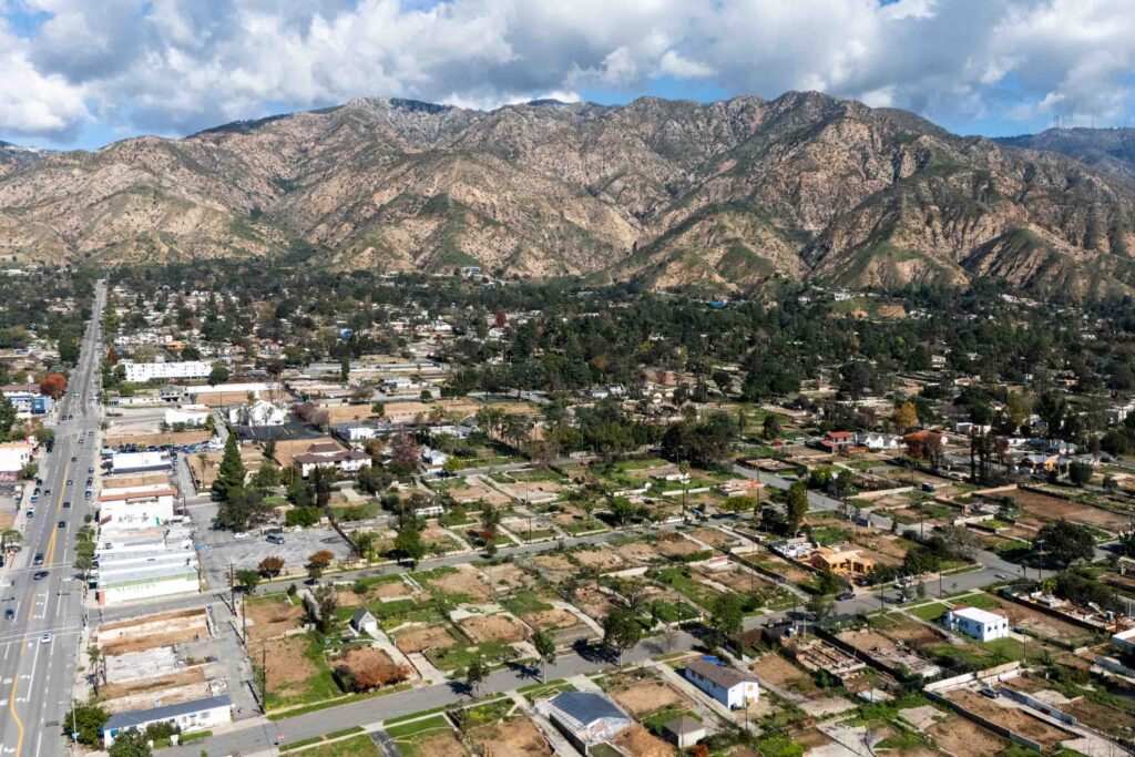 An aerial view of Altadena one year after the Eaton Fire.