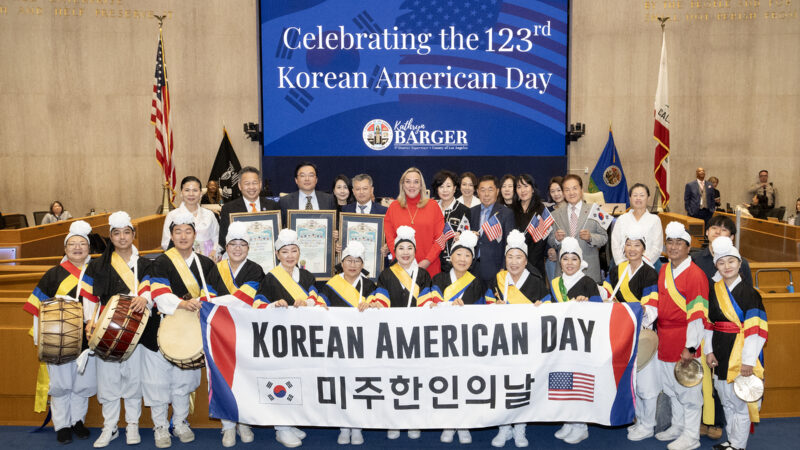 Supervisor Kathryn Barger poses with Korean American honorees and Samulnori percussion performers in the Board of Supervisors Hearing Room. (Photo credit: Diandra Jay/LA County)