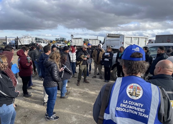 Members of the Pathway Home Encampment Resolution Team gather at the Lancaster site before beginning coordinated outreach and cleanup efforts.